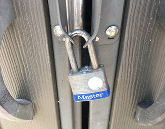 Master Lock lock securing a closed set of doors